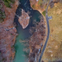 We're Looking At A River And Some Trees... And A Road.