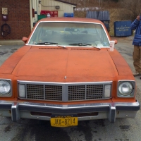 Orange Oldsmobile Omega